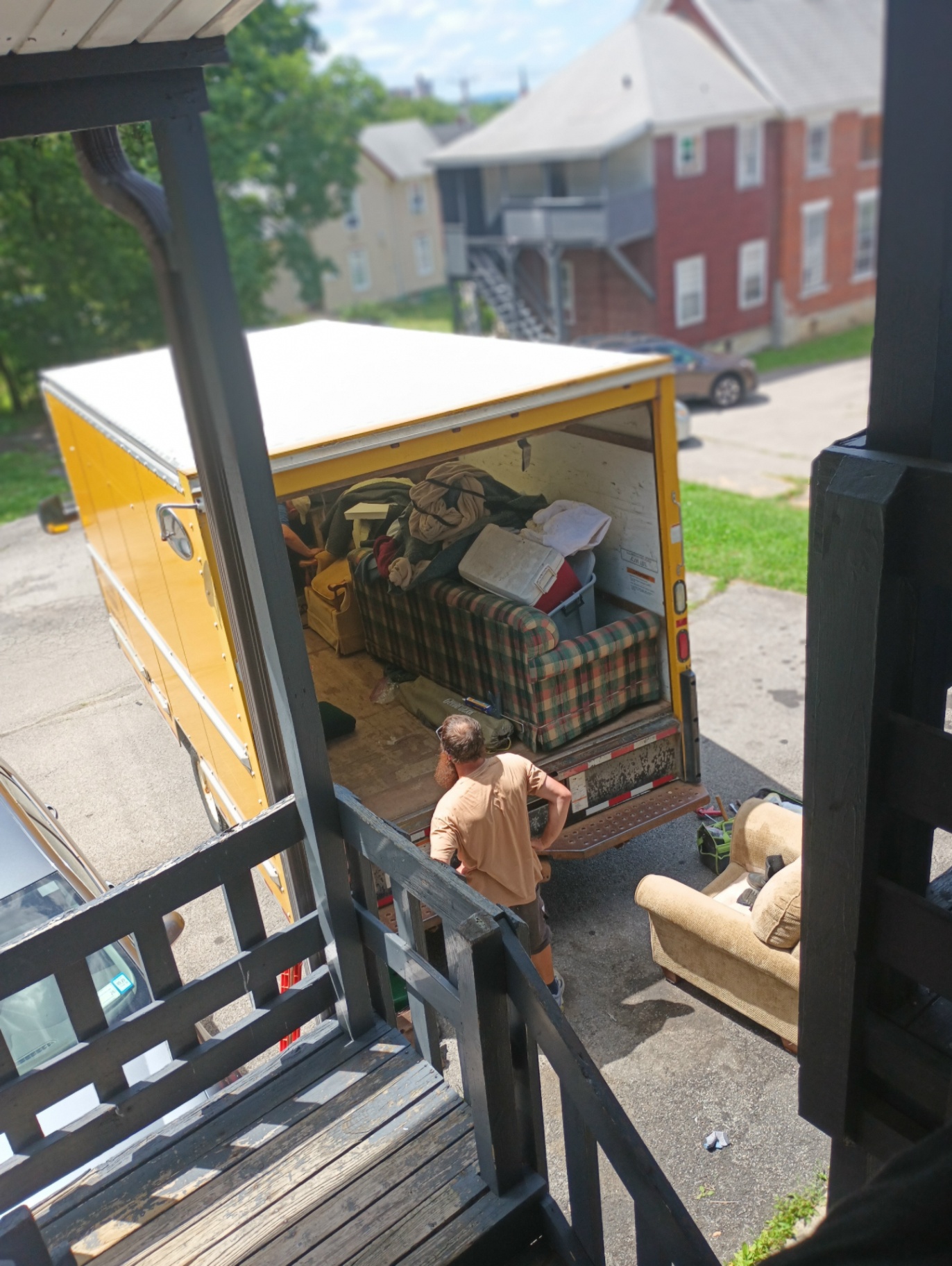 A moving truck delivering donated furniture to a new home in Broome County